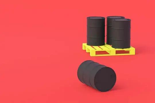 biggest drop in oil prices since November represented by a picture of two black oil barrels on the red background