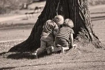 Two children finding a valuable gold treasure