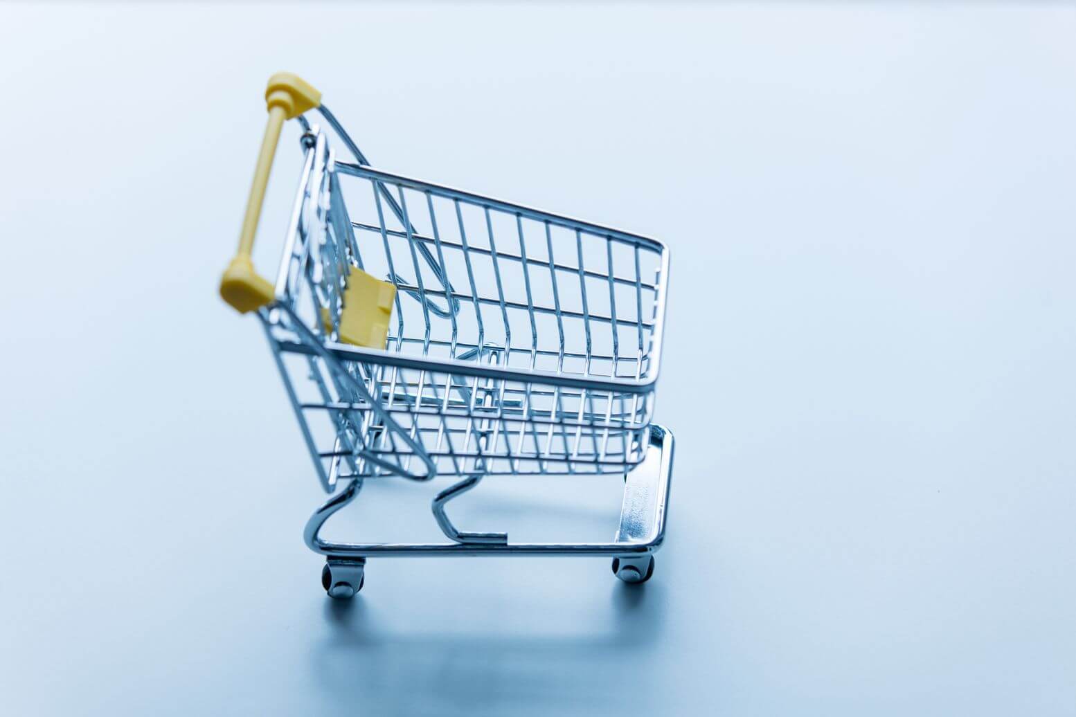 a silver shopping cart a silver shopping cart